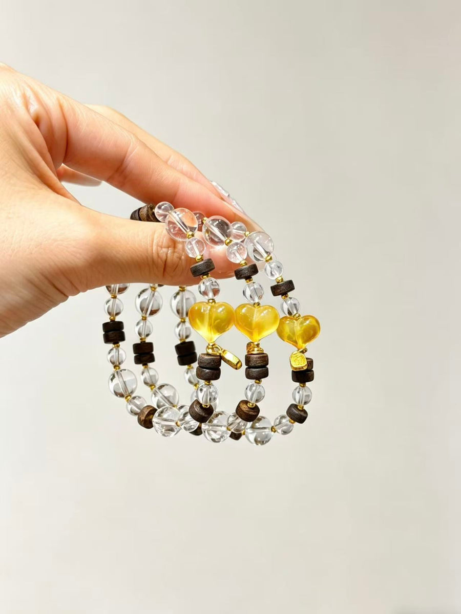 Crystal Paradise White Quartz Agarwood Amber Bracelet – Handmade Healing Energy Bracelet with Peach Amber Charm 🌿